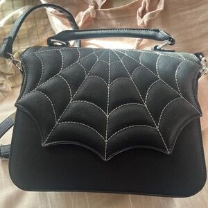 Spider web purse